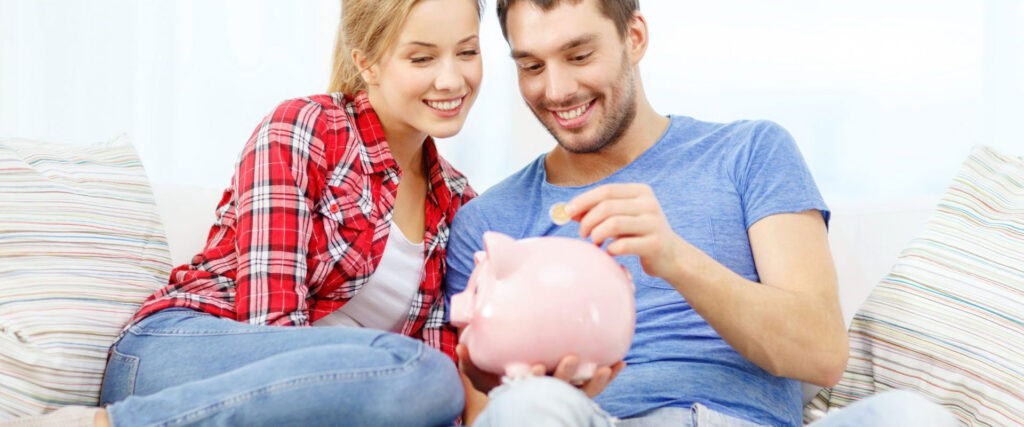 Young Couple Saving Up For A Down Payment On A House